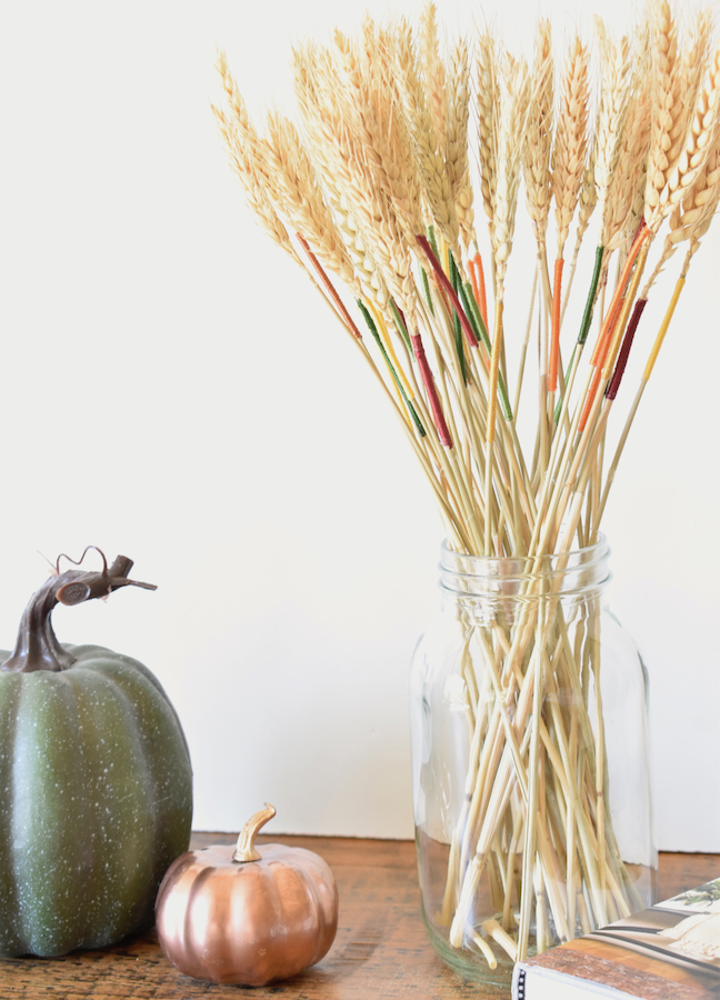 Add A Pop of Color This Fall With Embroidery String On A Dried Wheat Arrangement