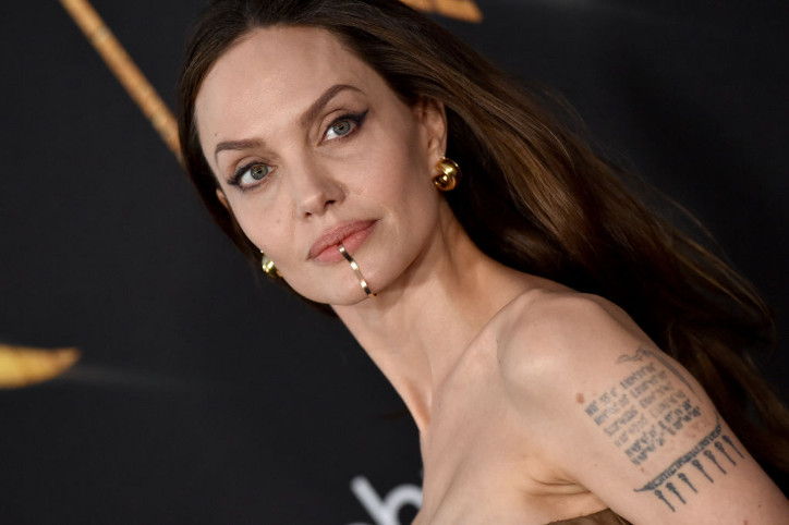 10 Celebrity Moms With Kid-Inspired Tattoos
