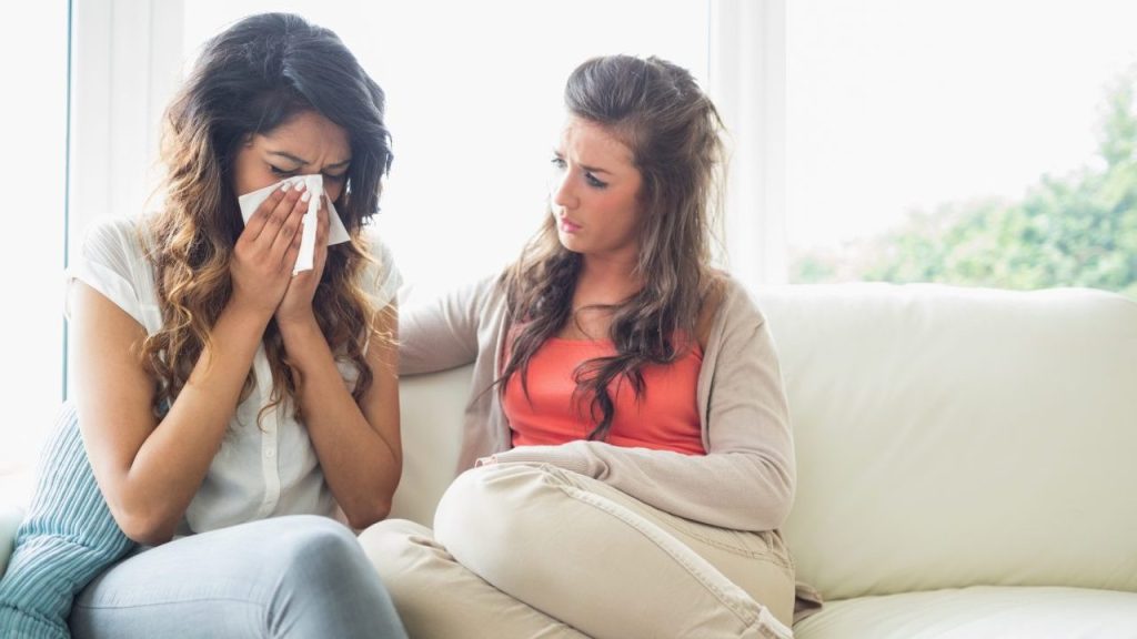 woman comforting friend with secondary infertility