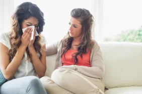 woman comforting friend with secondary infertility