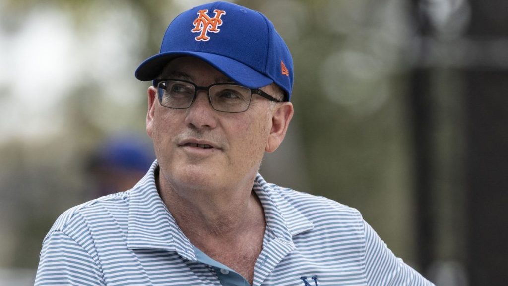 New York Mets owner Steve Cohen watches his team during a spring training workout, in Port St. Lucie, Florida, on February 19, 2023.