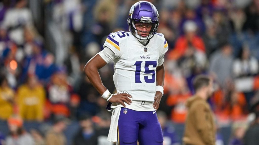Joshua Dobbs #15 of the Minnesota Vikings warms up before a game against the Denver Broncos at Empower Field at Mile High on November 19, 2023 in Denver, Colorado.