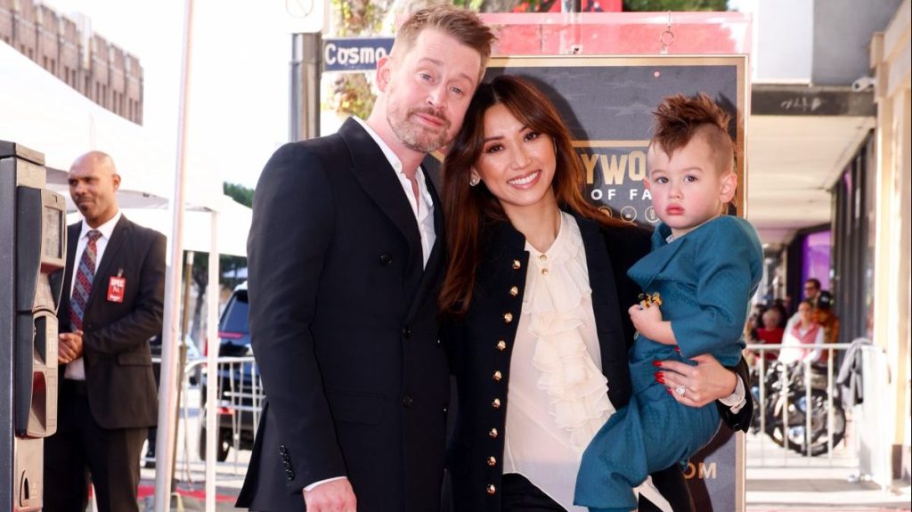 Macaulay Culkin, Brenda Song and Dakota Song Culkin at the star ceremony where Macaulay Culkin is honored with a star on the Hollywood Walk of Fame on December 1, 2023 in Los Angeles, California.