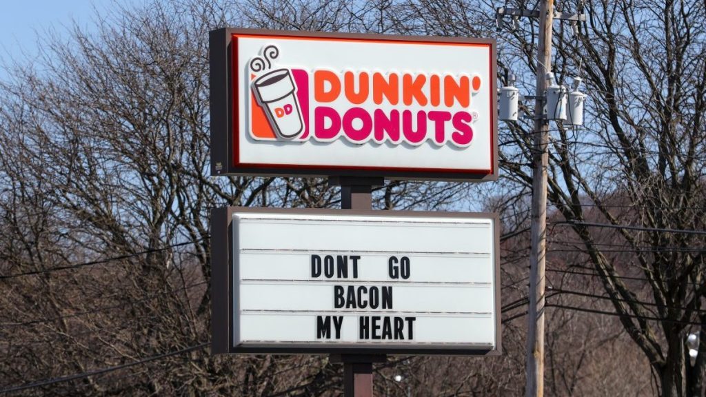 A sign with the Dunkin' Donuts logo is seen at its restaurant along North 4th Street in Sunbury, Pa.