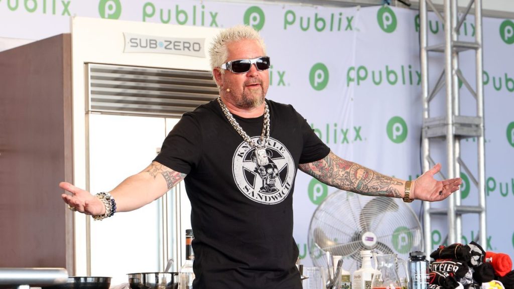Guy Fieri is seen during the South Beach Wine and Food Festival Grand Tasting on February 25, 2023 in Miami Beach, Florida.