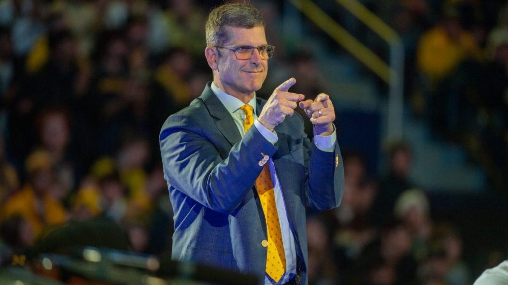 Head Football Coach Jim Harbaugh of the Michigan Wolverines is seen onstage during the National Championship Celebration at Crisler Center on January 13, 2024 in Ann Arbor, Michigan.