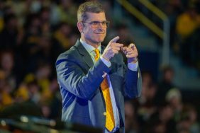 Head Football Coach Jim Harbaugh of the Michigan Wolverines is seen onstage during the National Championship Celebration at Crisler Center on January 13, 2024 in Ann Arbor, Michigan.