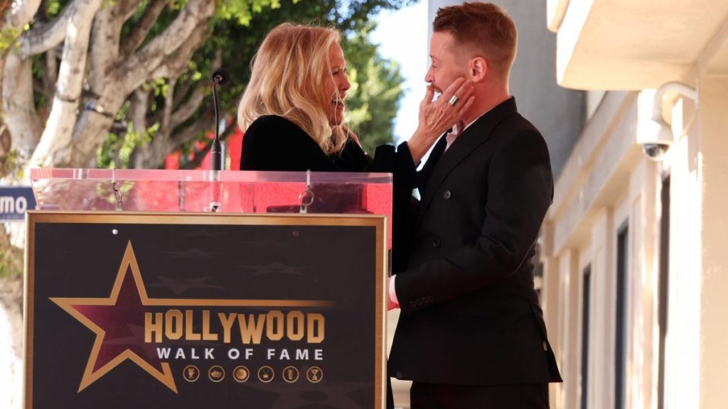 Catherine O'Hara and Macaulay Culkin at the star ceremony where he is honored with a star on the Hollywood Walk of Fame on December 1, 2023 in Los Angeles, California.