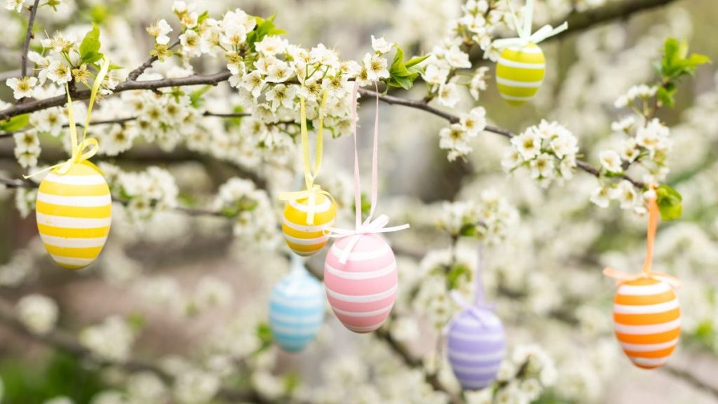 Easter decorative composition with painted eggs, flowering branches