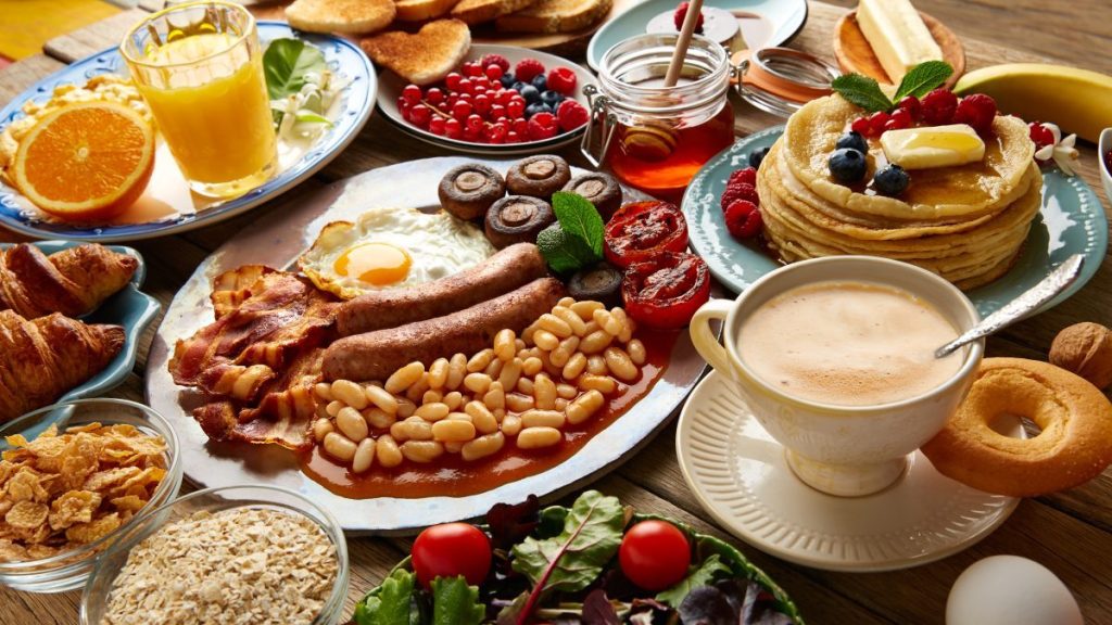 Breakfast buffet full continental and english coffee orange juice salad croissant fruit