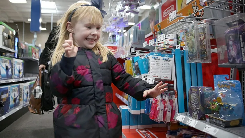 Charlotte Bryan, 4 years old, excited to check out the Nintendo Pokemon and lego section at Best Buy on Wednesday, December 21, 2016, in San Francisco, Calif.