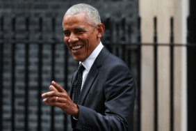 Barack Obama photobomb kids cherry blossom shoot