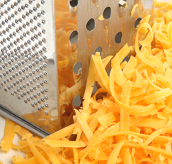 Easily Clean a Cheese Grater With a Potato
