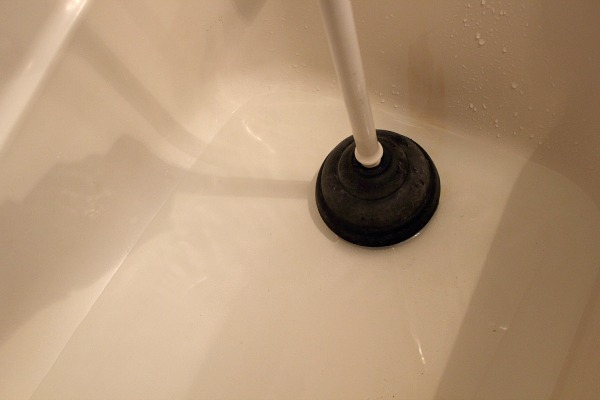 Unclog the Tub With a Plunger