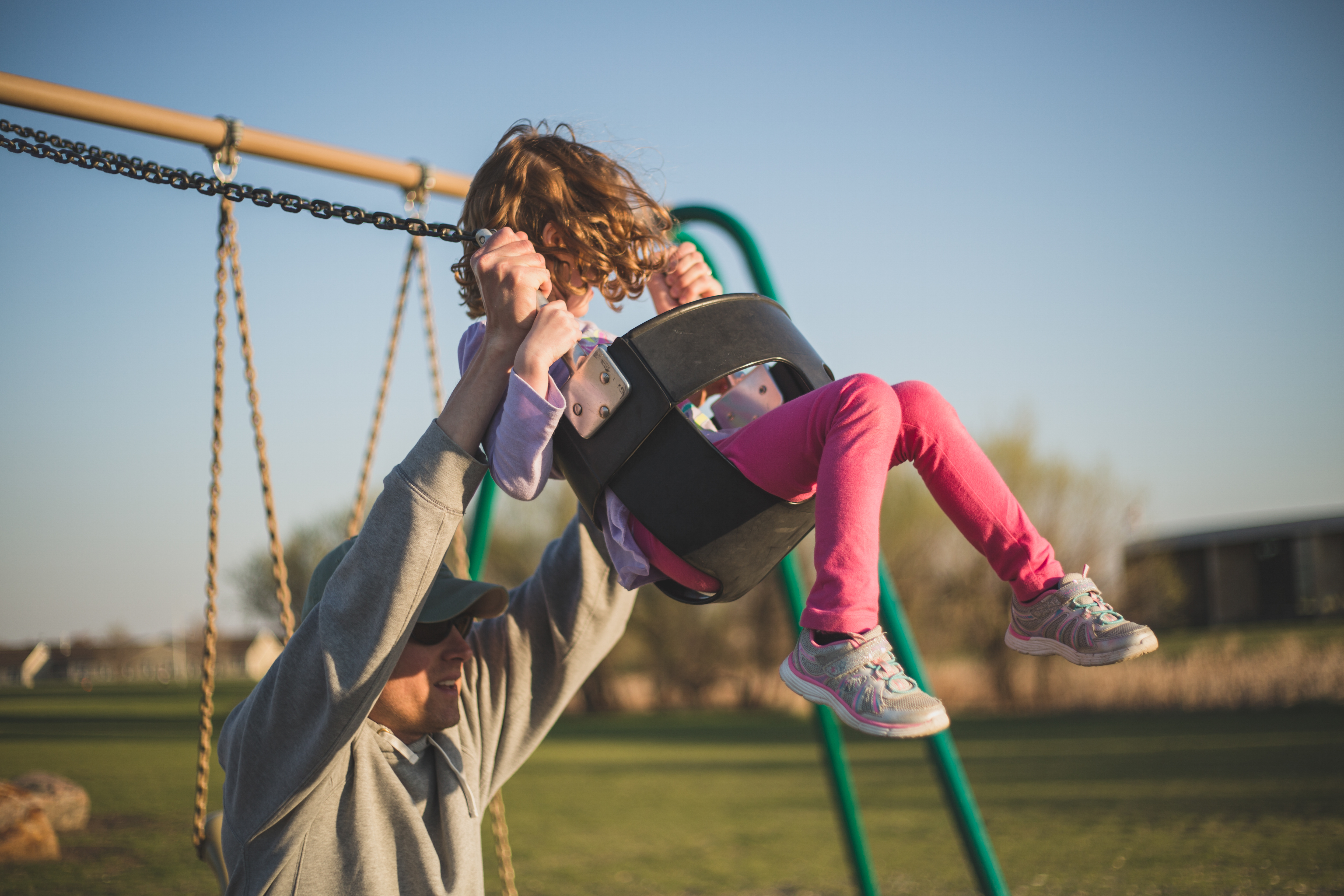 Push them high on a swing