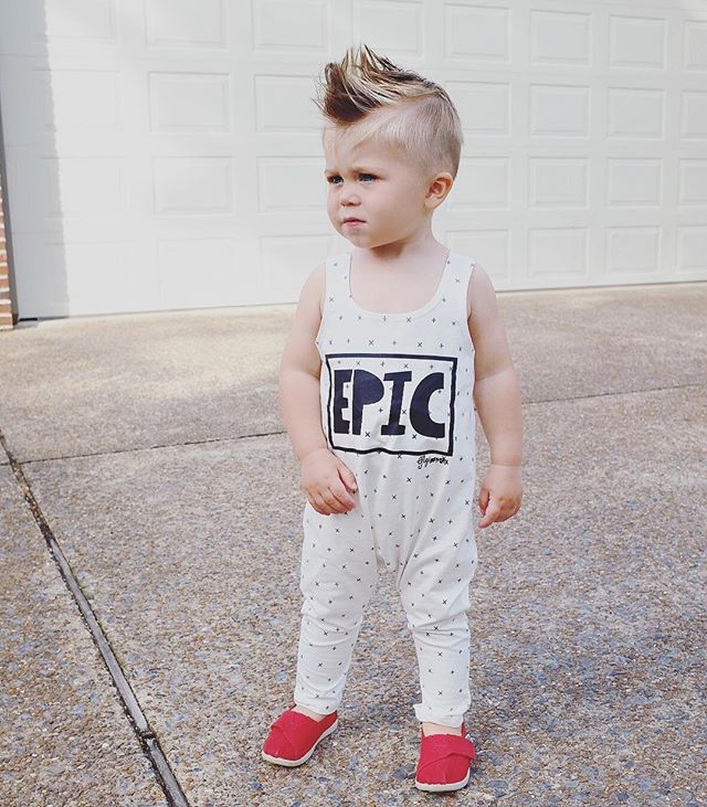 cool spiky faux hawk hair cut on little boy on toddler in red shoes