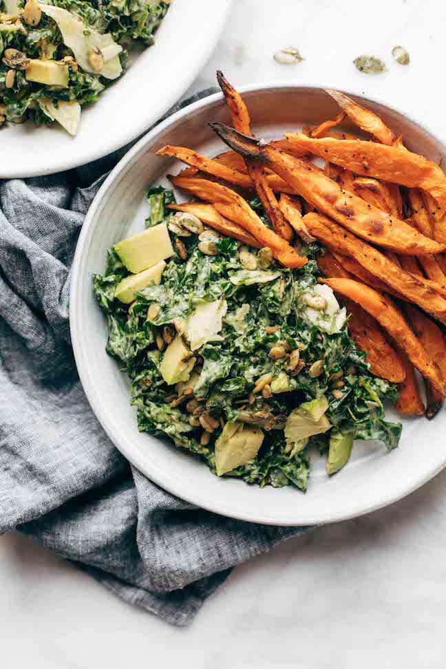 Avocado Kale Caesar Salad and Sweet Potato Fries