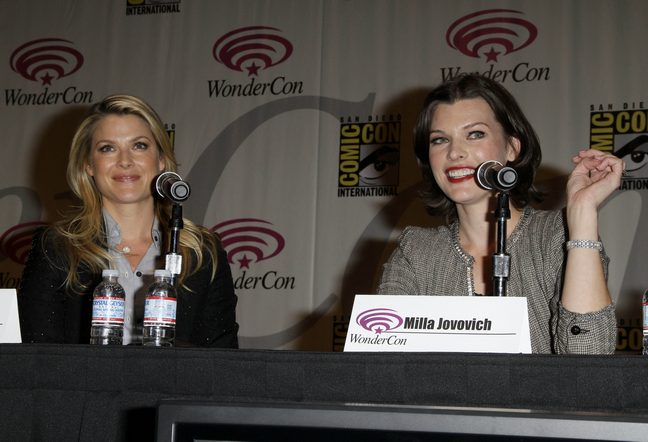 Ali Larter black blazer jacket, gray button down shirt, Milla Jovovich beige jacket, bracelet