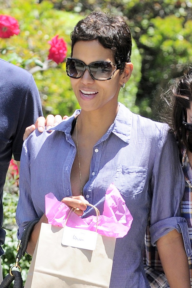 Halle Berry, sunglasses, blue blouse, gift bag