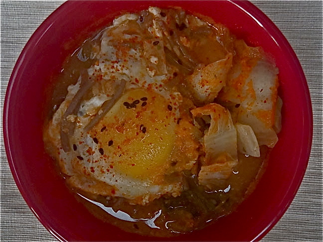 Kimchee Soba Noodles in a red porcelain bowl