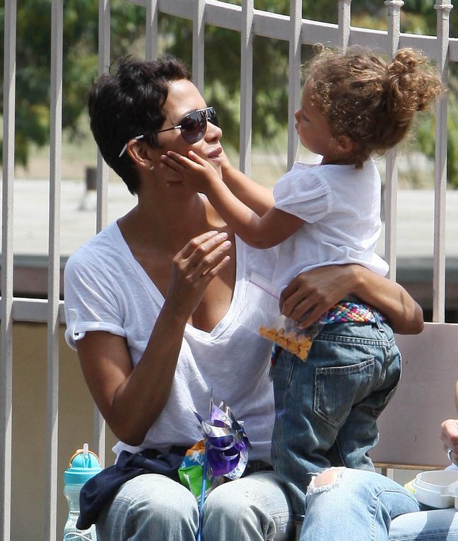 Halle Berry, White blouse, denim capris, brown sandals, sunglasses